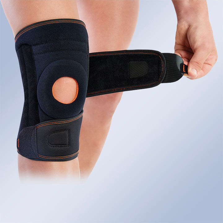 RODILLERA ENVOLVENTE CON FLEJES MEDIO-LATERALES